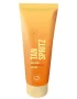 Tan Spritz soliariumo kremas 100 ml – įdegį greitinantis ir nuo odos senėjimo saugantis losjonas su citrusiniu kvapu, oranžinės spalvos pakuotė